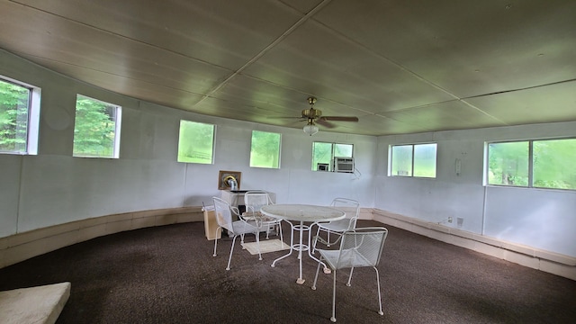 interior space featuring ceiling fan