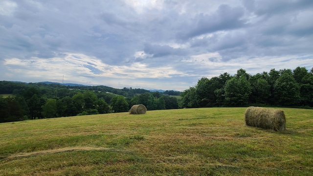 mountain view featuring a rural view