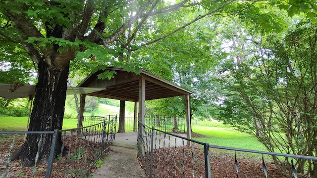 view of home's community featuring a yard