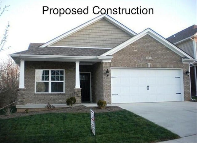 craftsman inspired home featuring a front yard and a garage