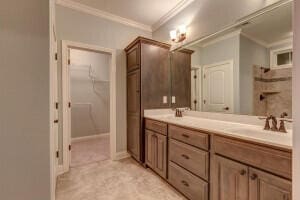 bathroom featuring double sink vanity and ornamental molding