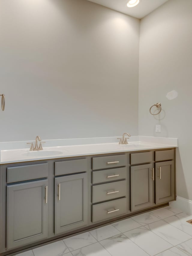 bathroom featuring vanity and tile floors