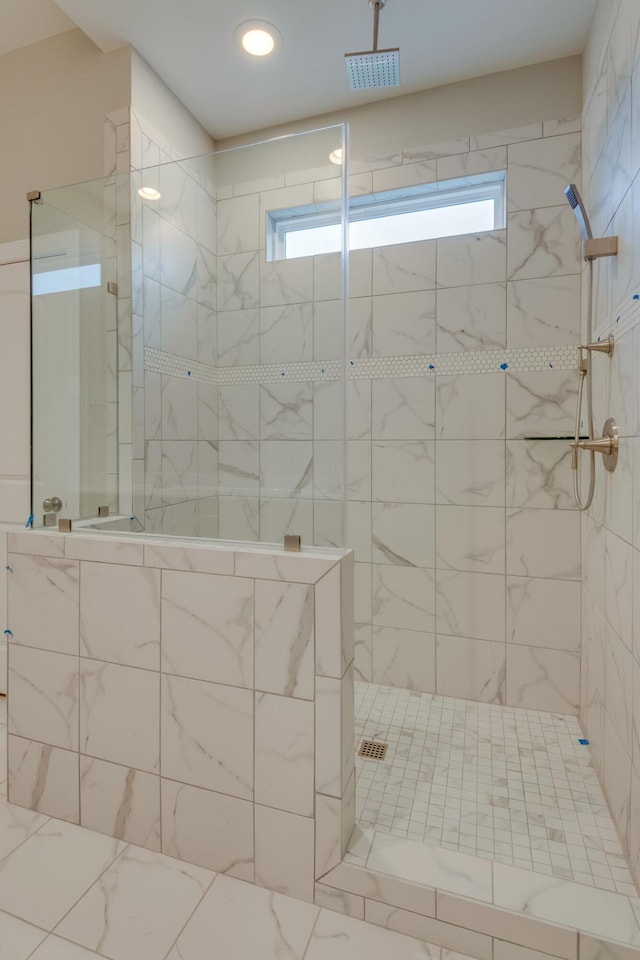 bathroom with an enclosed shower