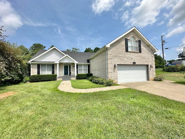 view of front of home with a garage and a front yard