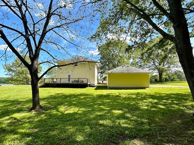 view of yard with a wooden deck