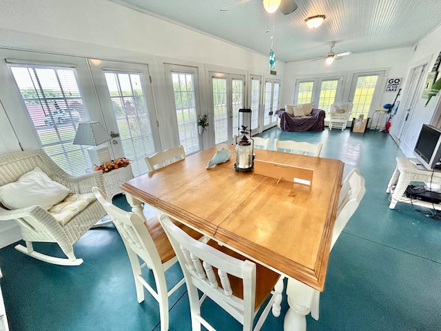 dining room featuring plenty of natural light, french doors, and ceiling fan