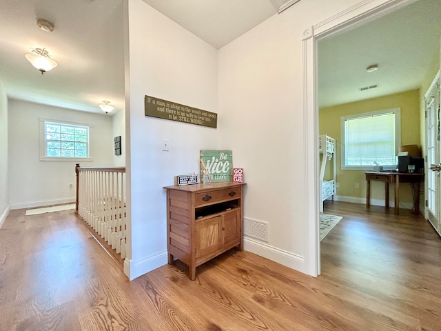 hall featuring light hardwood / wood-style floors