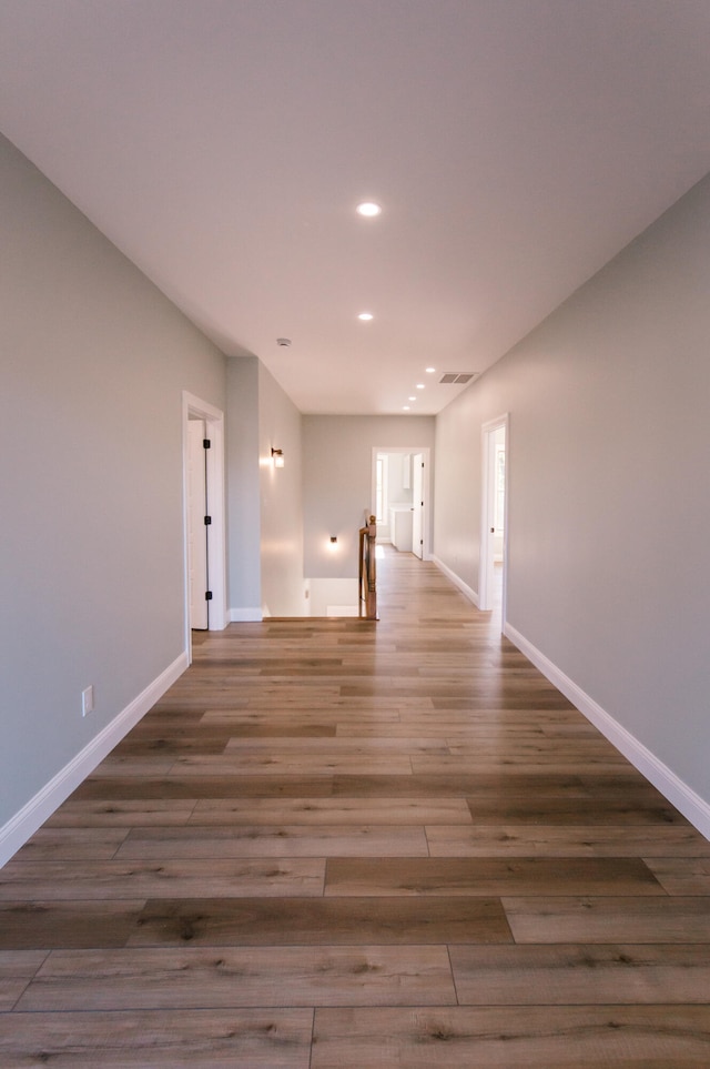 empty room with dark hardwood / wood-style floors