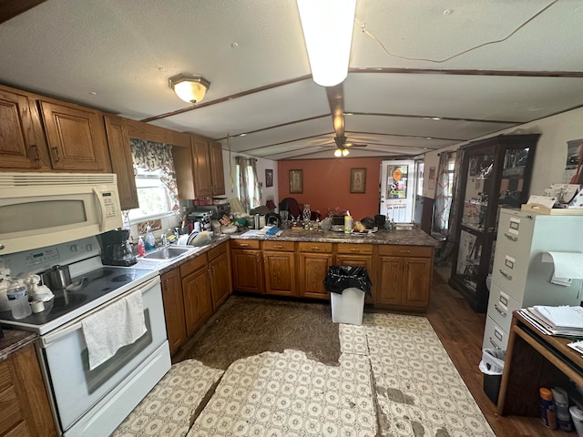 kitchen with ceiling fan, white appliances, lofted ceiling, light wood-type flooring, and sink