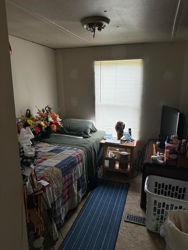 bedroom with a textured ceiling