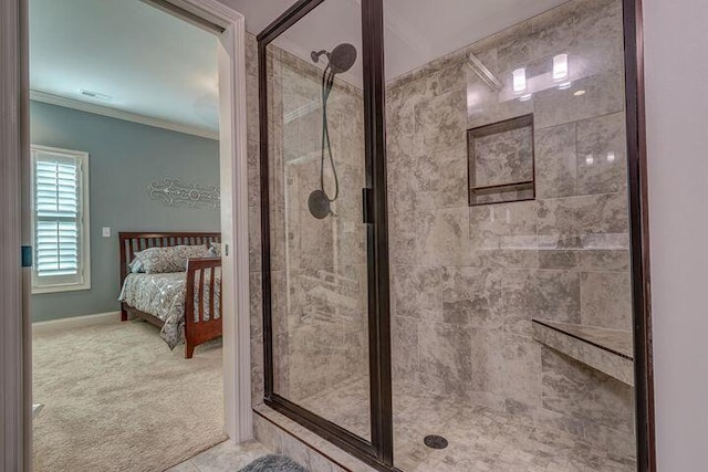 bathroom with an enclosed shower, tile floors, and crown molding