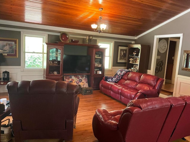 living room featuring a chandelier, wooden ceiling, light wood-type flooring, and crown molding