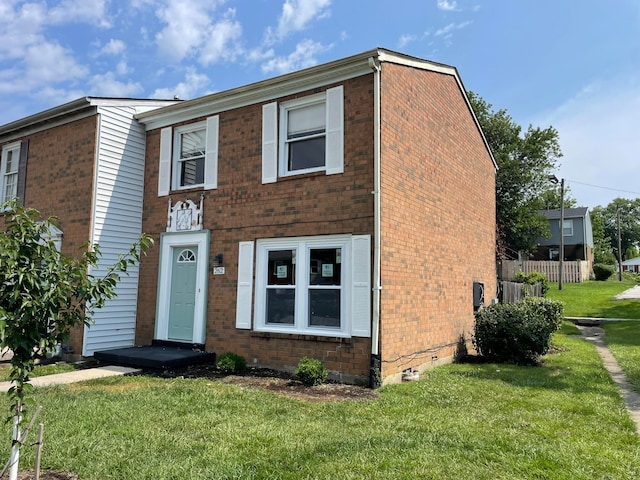 view of front of house with a front lawn