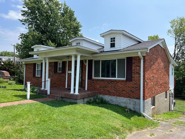 bungalow-style house featuring a front yard