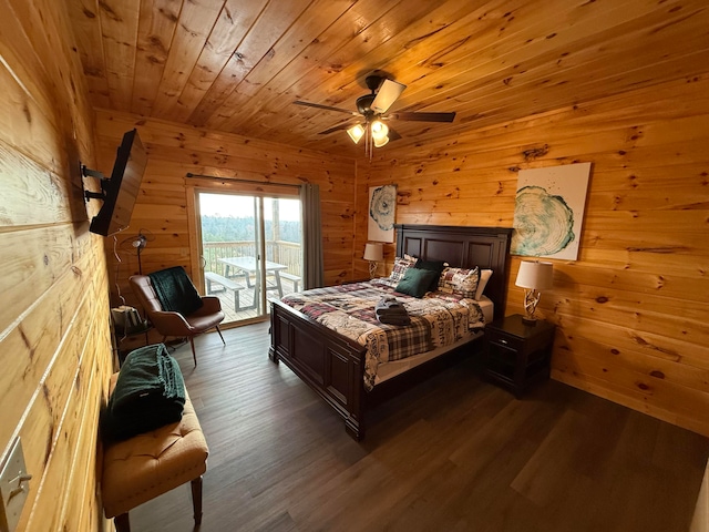 bedroom with wood walls, access to outside, ceiling fan, dark hardwood / wood-style floors, and wood ceiling