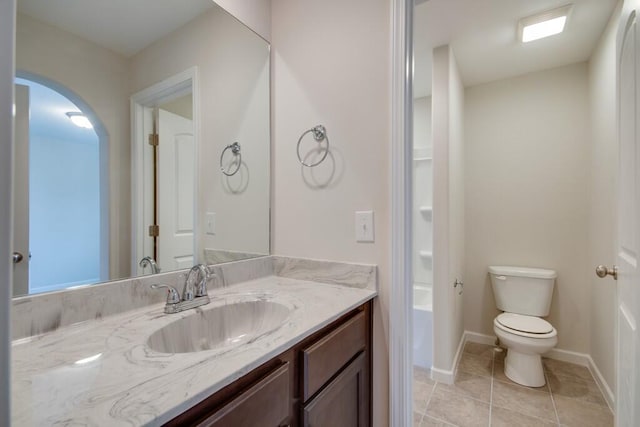 full bathroom with tile floors, toilet, vanity, and shower / bath combination