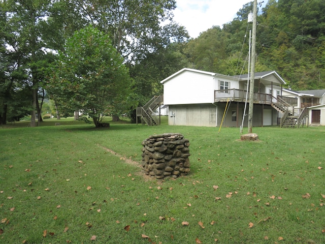 view of yard with a deck