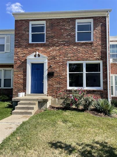 view of front of home with a front yard