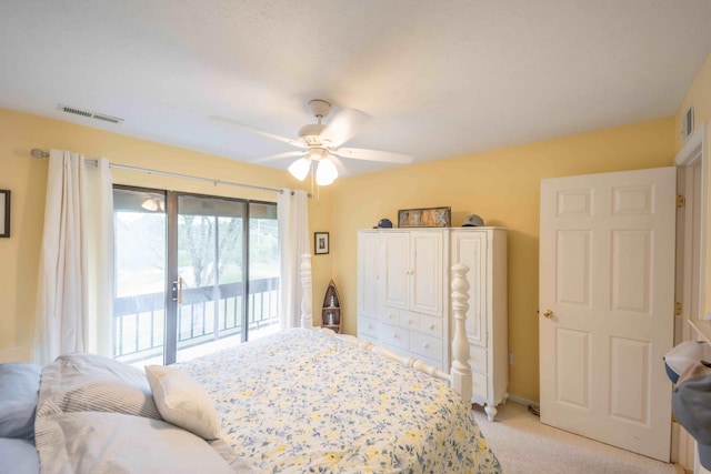 bedroom featuring ceiling fan, access to exterior, and light colored carpet