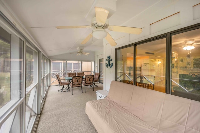 sunroom / solarium featuring vaulted ceiling and ceiling fan