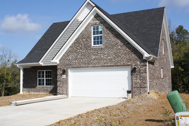 view of front of property with a garage