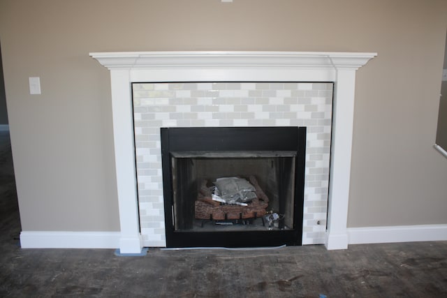 interior details featuring dark hardwood / wood-style flooring