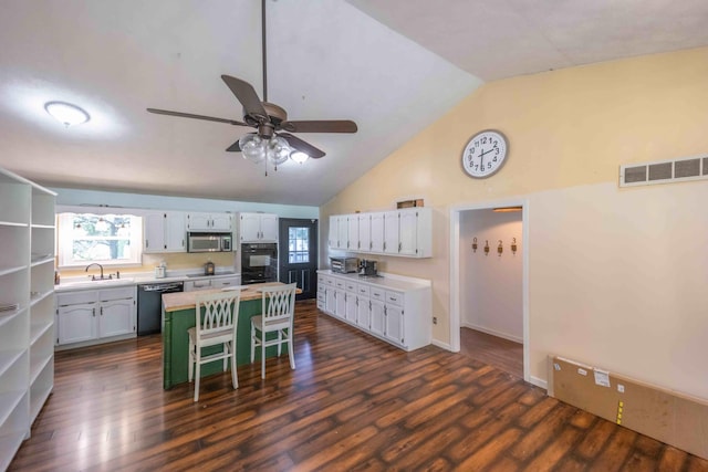 kitchen featuring ceiling fan, white cabinetry, black appliances, and dark hardwood / wood-style flooring