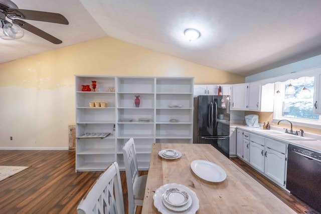 kitchen with ceiling fan, lofted ceiling, black appliances, and sink