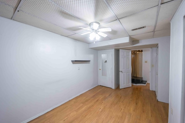 unfurnished room featuring ceiling fan and light wood-type flooring