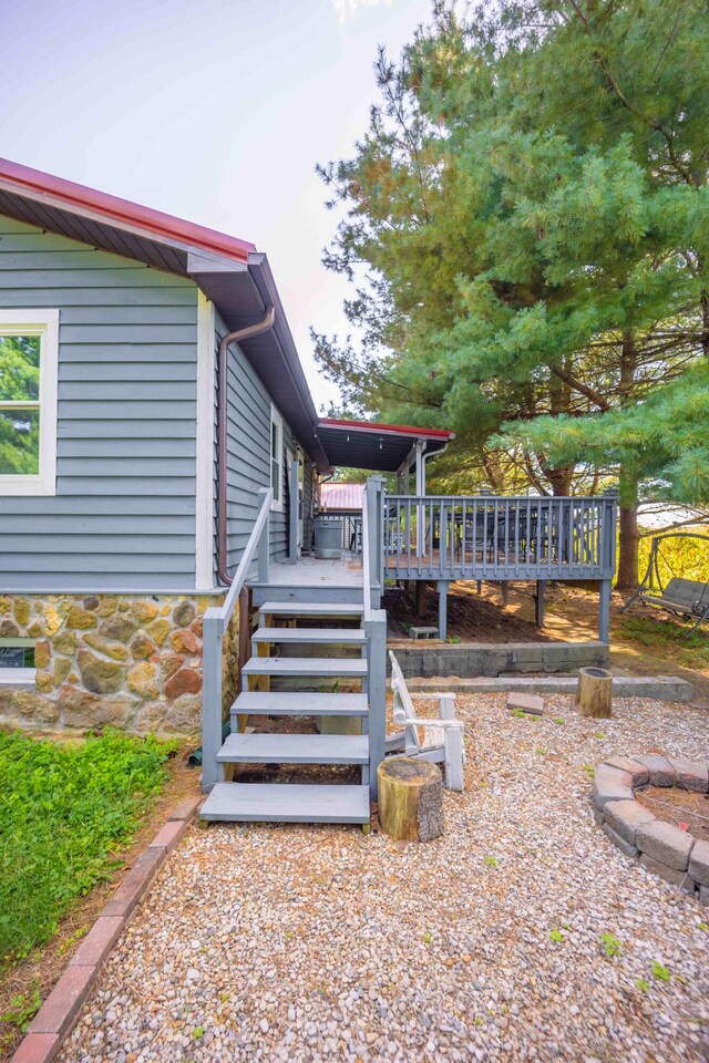 exterior space with a wooden deck