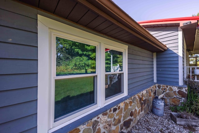 exterior space featuring wooden walls