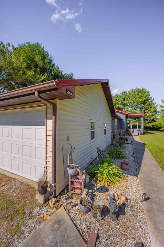 view of property exterior with a garage