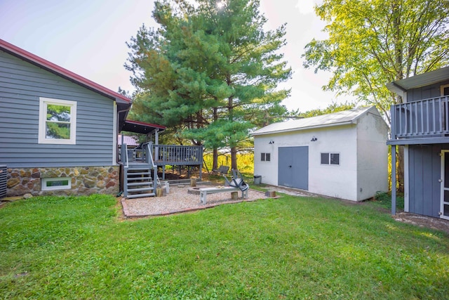 view of yard with a deck