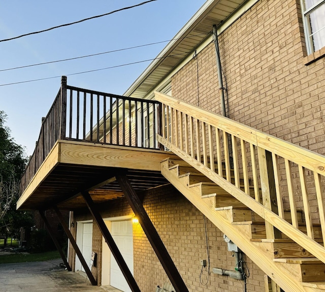 exterior space with a garage and a deck