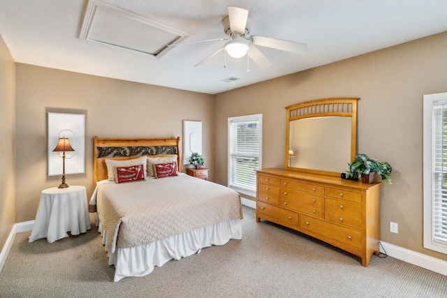 carpeted bedroom with ceiling fan