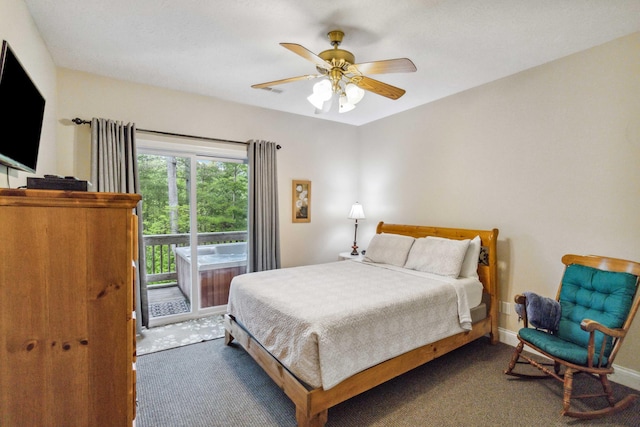 bedroom with dark carpet and ceiling fan