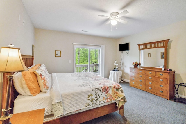 bedroom with access to exterior, ceiling fan, and carpet