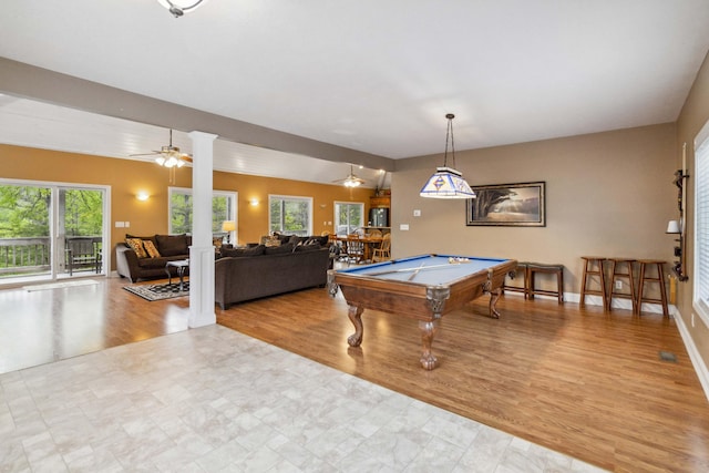 recreation room featuring a wealth of natural light, light hardwood / wood-style flooring, lofted ceiling, and billiards