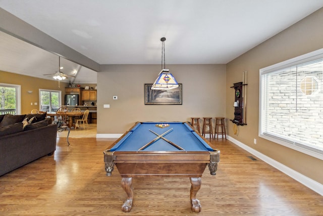 rec room with vaulted ceiling with beams, ceiling fan, light wood-type flooring, and billiards