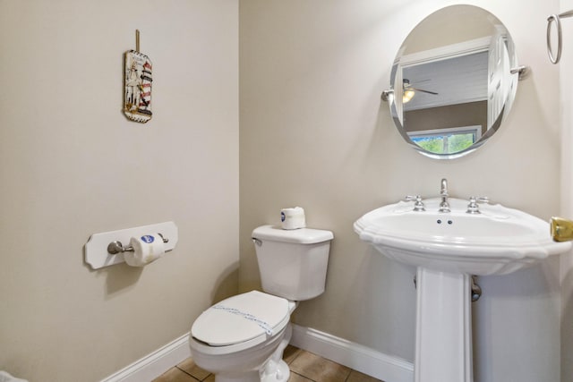 bathroom featuring tile patterned flooring and toilet