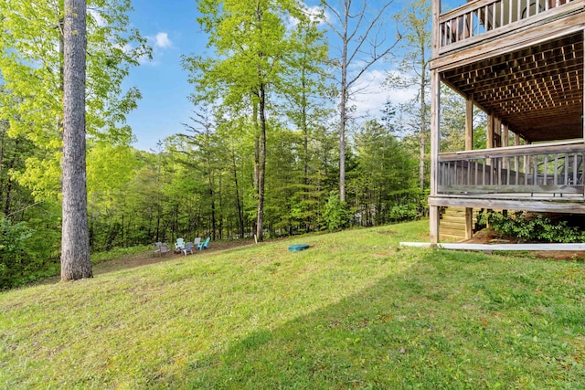 view of yard with a deck