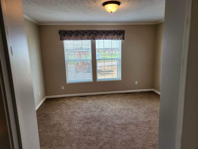 unfurnished room featuring dark colored carpet, a textured ceiling, and crown molding