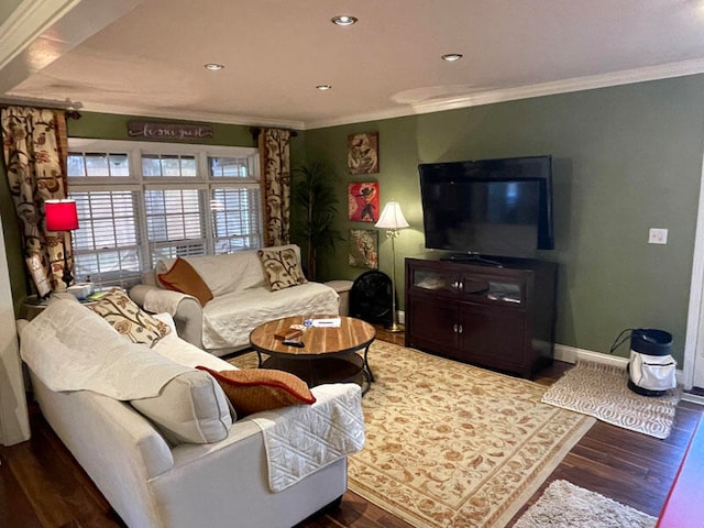 living room featuring crown molding and dark hardwood / wood-style flooring