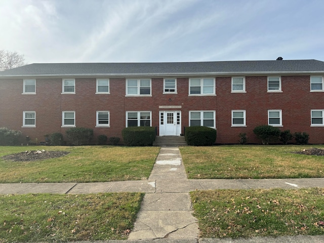 view of front facade with a front lawn