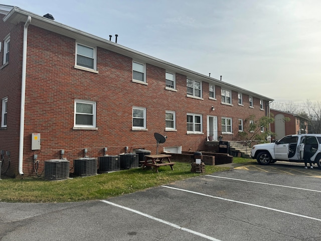 view of property featuring central air condition unit