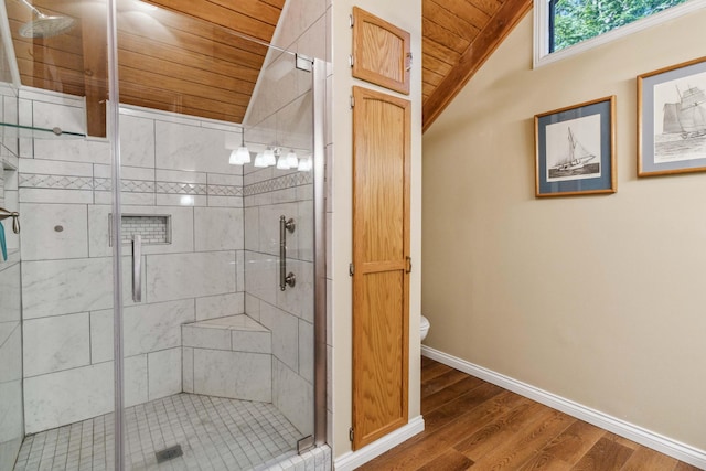 bathroom featuring an enclosed shower, wood ceiling, hardwood / wood-style floors, toilet, and lofted ceiling