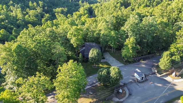 drone / aerial view with a view of trees