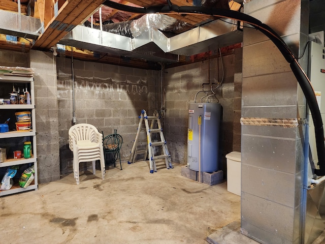 unfinished basement featuring heating unit and electric water heater