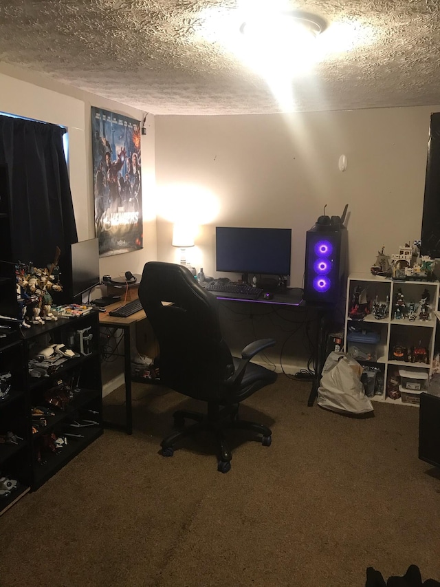 office space featuring carpet flooring and a textured ceiling