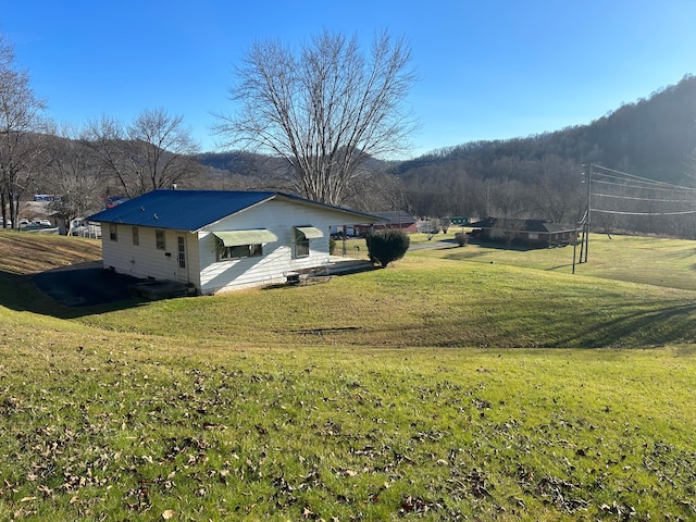 exterior space with a lawn